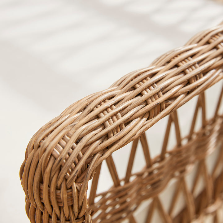 Detail of hand woven open weave design on garden sofa