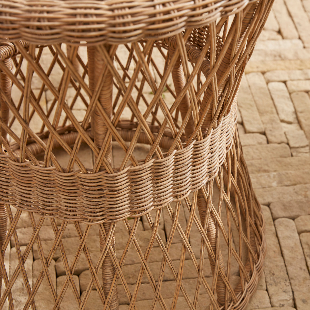 Detail of beautiful hand woven open weave rattan design for the garden