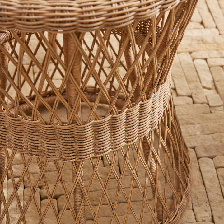 Detail of beautiful hand woven open weave rattan design for the garden