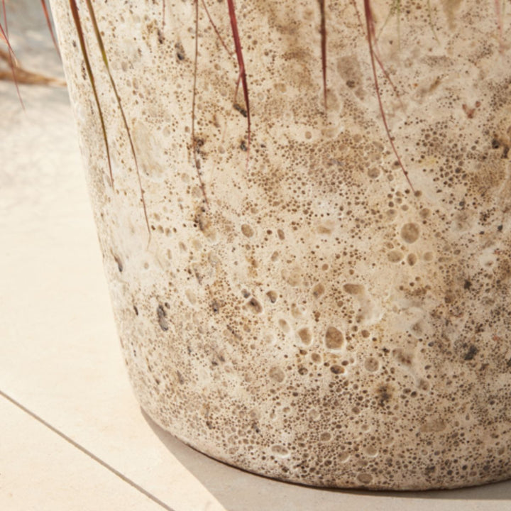 Textured finish of the white Eris Ancient Glazed Stone Plant Pot