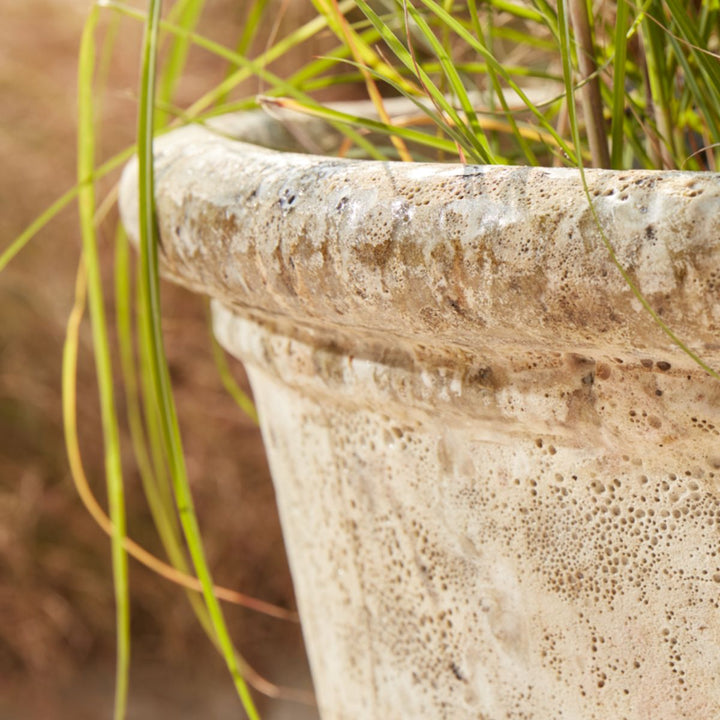 Detail of white Eris  Ancient Glazed Stone Plant Pot with a traditional weathered finish