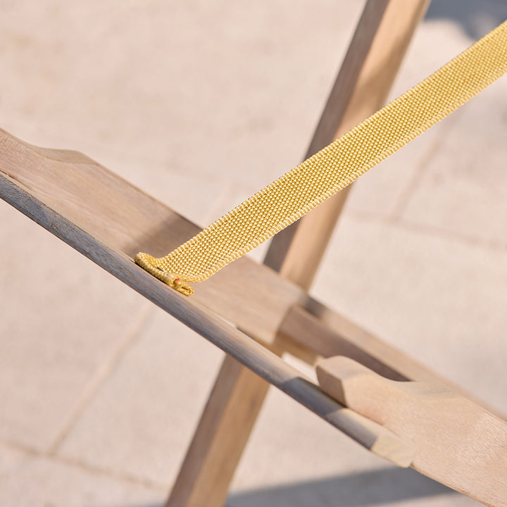 Close-up of butlers tray stand with a blurred background.