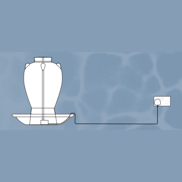 A digital illustration showing the water feature connected to a power source, demonstrating its plug-and-play setup.