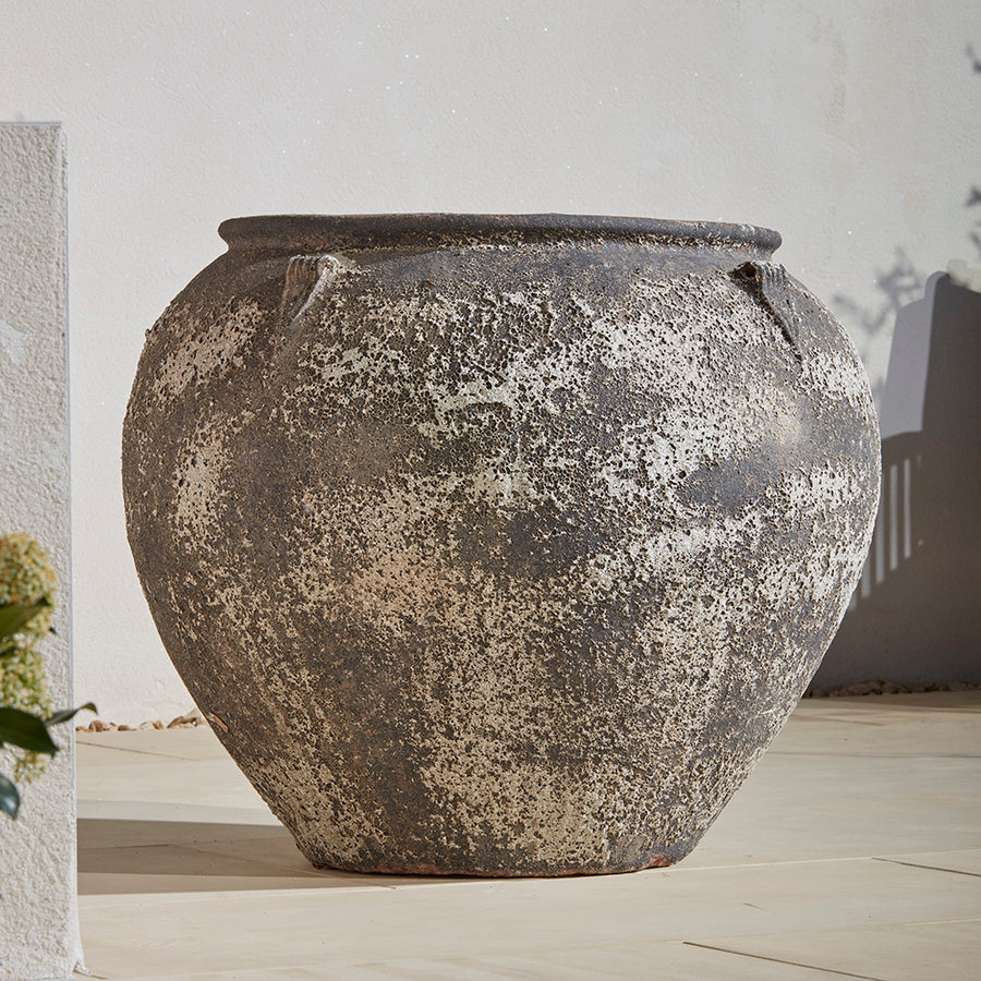 Extra Large 86cm wide stone antique effect garden jar plant pot. Left unplanted and still making a statement in the garden. Large rounded shape is timeless
