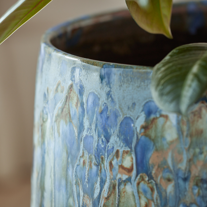 Close-up of the Azura Indoor Plant Pot’s intricate blue glaze, highlighting its handcrafted texture and layered colour variations.