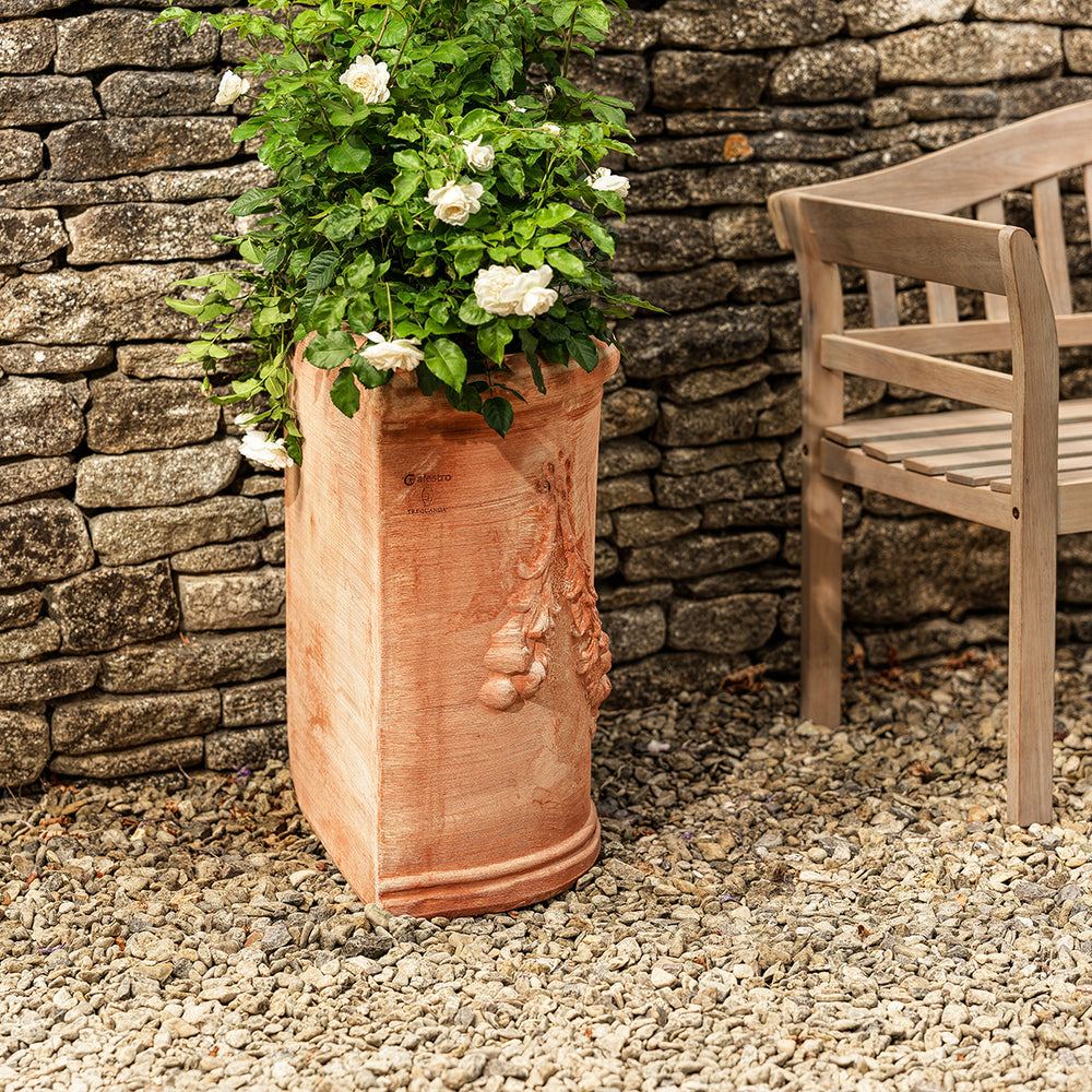 Traditional Delia Italian terracotta half wall planter with sculptural detail