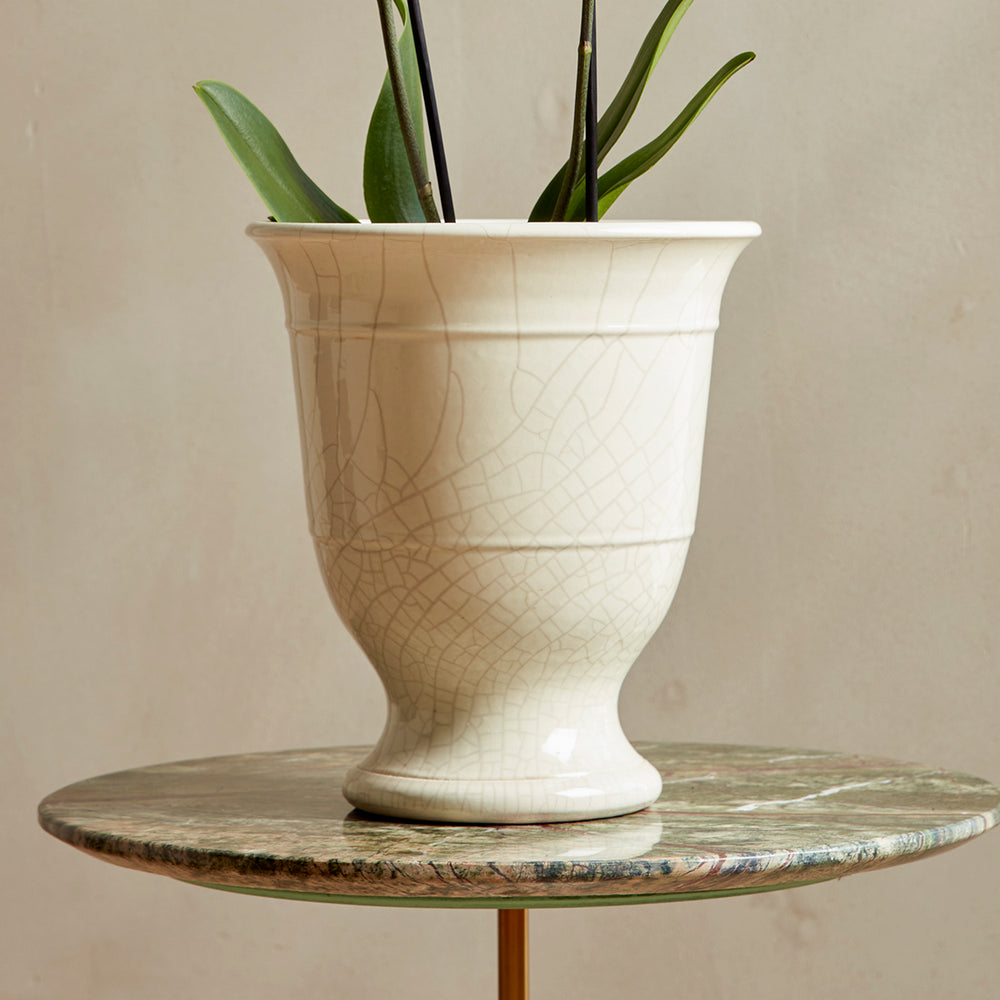 Marta cream ceramic planter with a crackle glaze finish, ideal for orchids and houseplants. Hand-moulded terracotta pot made in Portugal.