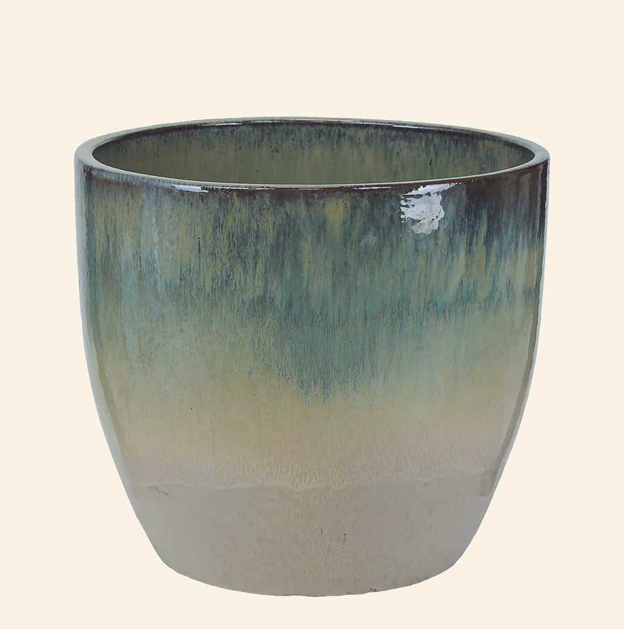 Large indoor plant pot in green and cream reactive glaze, Celine design, shown without drainage hole for indoor use