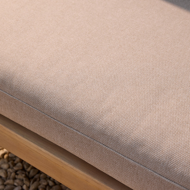 Close-up of a beige cushion on a wooden corner sofa