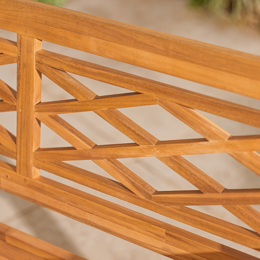 Close-up of a wooden lattice bench back structure with a blurred natural background