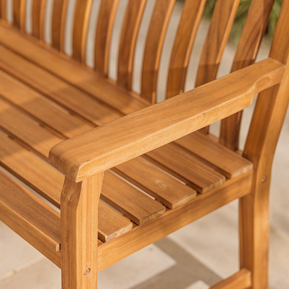 Close-up of a wooden bench with slatted design