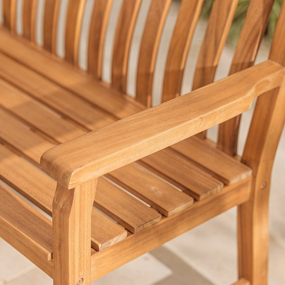 Close-up of a wooden bench with slatted design