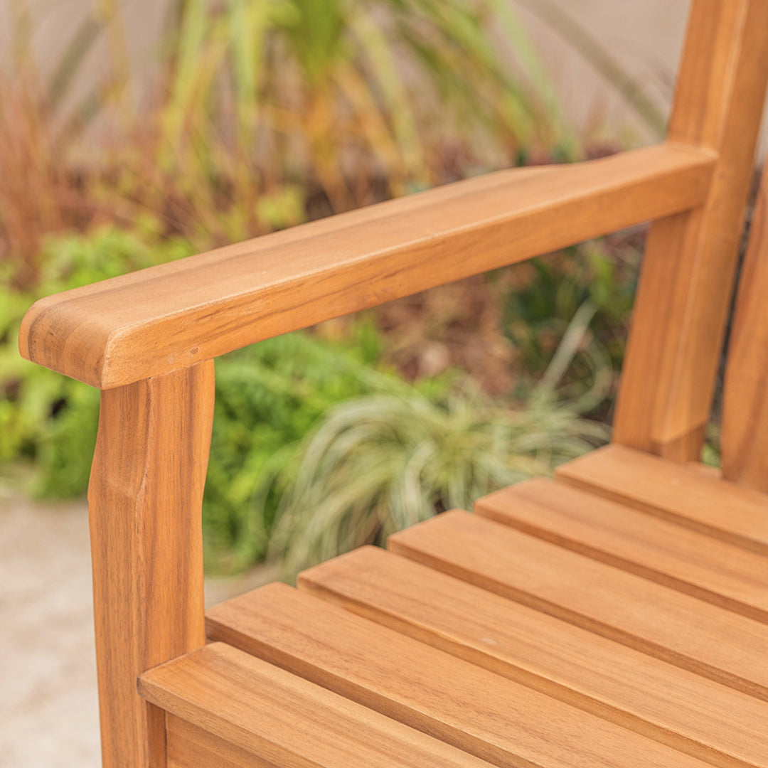 Close-up of a wooden bench with slatted design