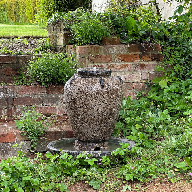 large weathered outdoor planter