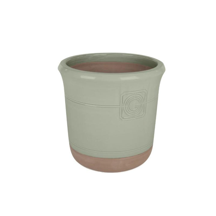 A standalone image of the sage green and terracotta planter against a white background, showcasing its tapered shape and embossed detailing.