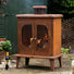 Outdoor Wood Burning Fireplace with Chimney at Gardenesque