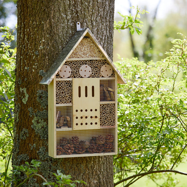 hanging wooden insect hotel for tree