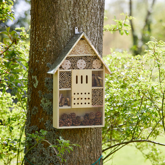 large wooden bug hotel