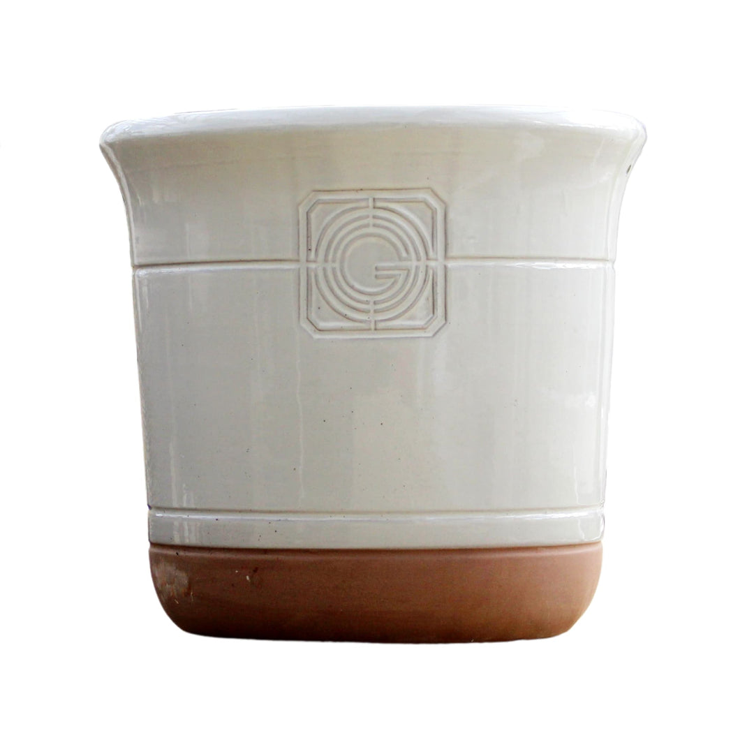 A standalone image of the white smoke and terracotta planter against a white background, showing its elegant shape and embossed detailing.