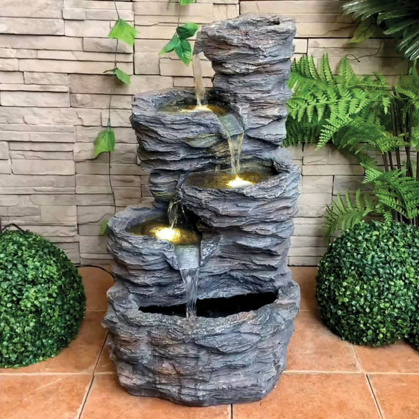 tiered outdoor water feature with lights