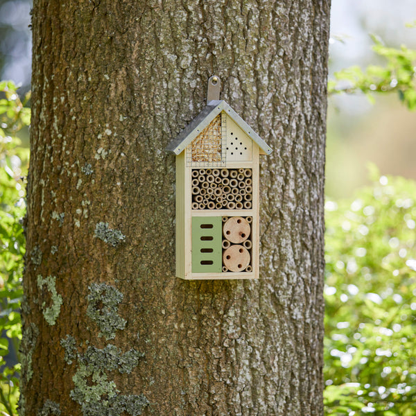 wooden insect house with roof